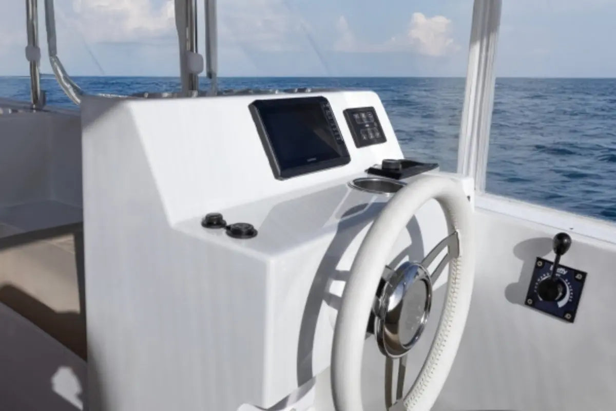 Duffy Balboa 20 Electric Boat steering wheel and dashboard with ocean view