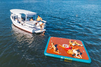 People on a Duffy Sun Cruiser 23 Electric Boat with a floating platform in the water