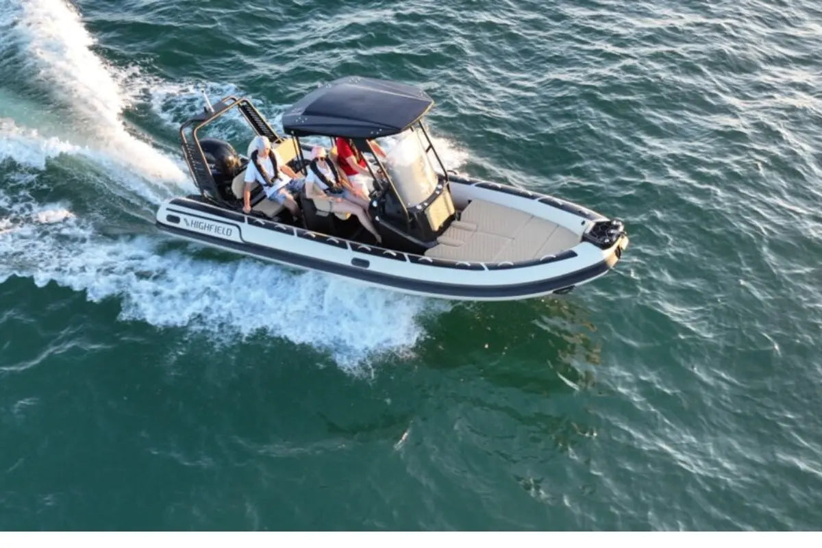 Flux Highfield Sport 660 Electric Boat speeding across a body of water