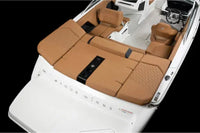 Four Winns H2e Electric Boat interior with brown cushioned seats and white exterior, featuring the brand 'Winns'.