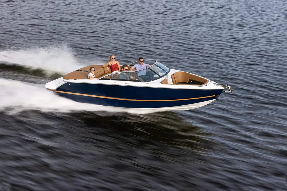 Four Winns H2e Electric Boat with passengers on a body of water