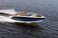Four Winns H2e Electric Boat with passengers on a body of water