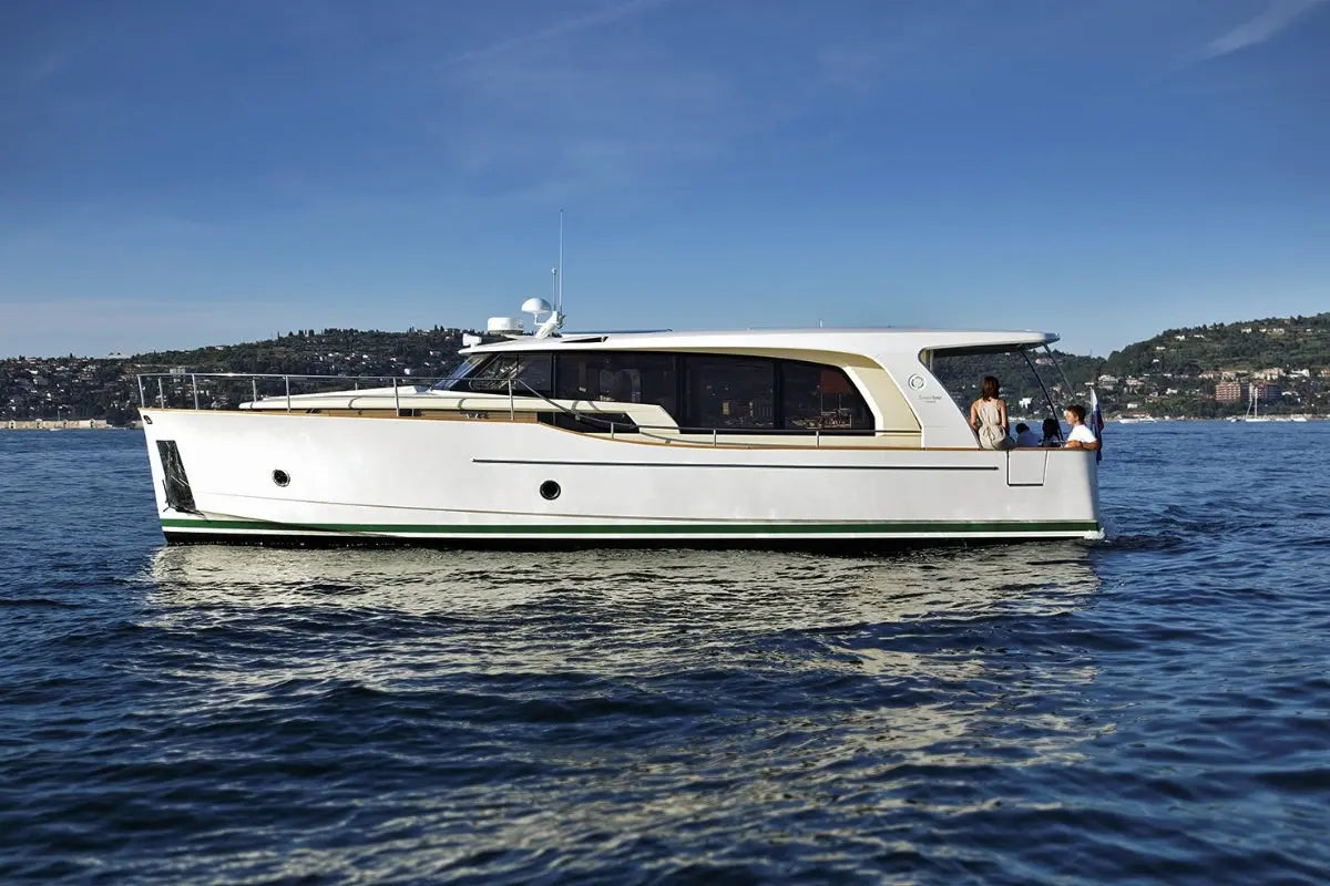 Greenline 40 Electric Yacht on a body of water with a clear blue sky