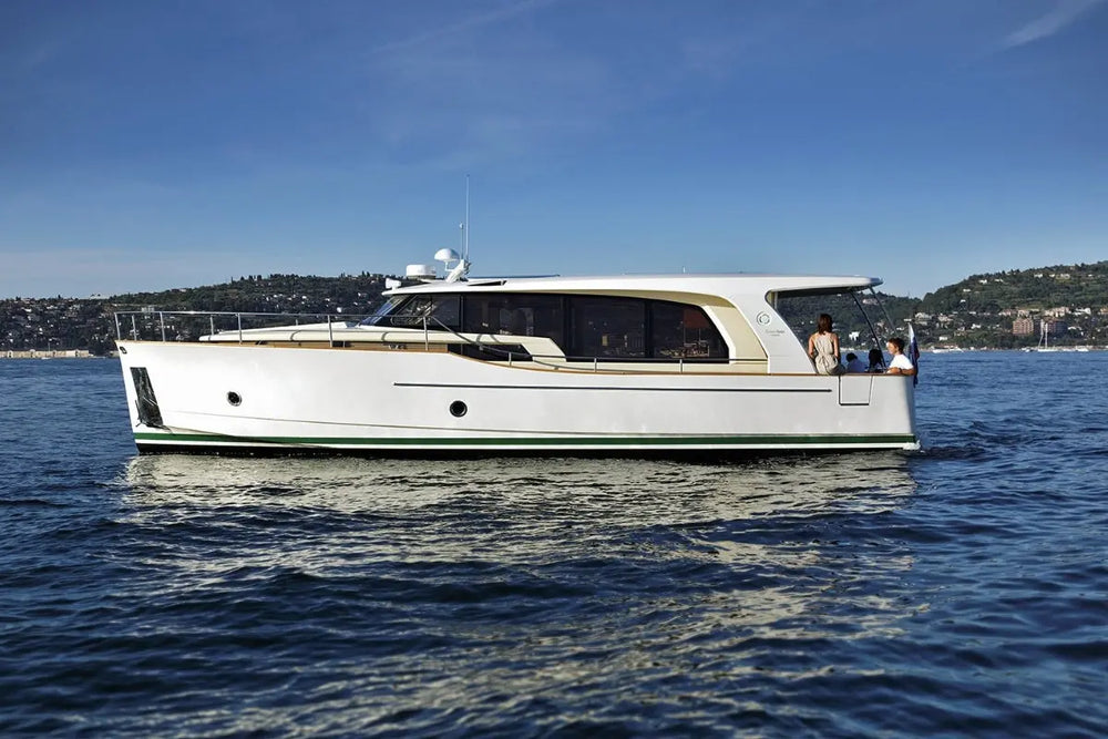 Greenline 40 Electric Yacht on a body of water with a clear blue sky