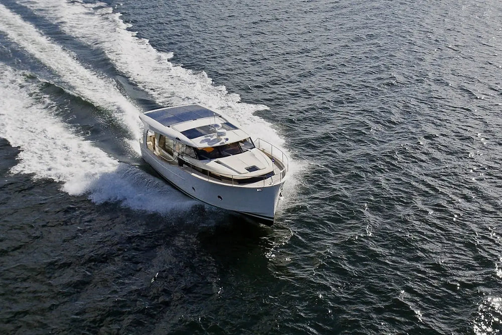 Greenline 40 Electric Yacht speeding across a body of water