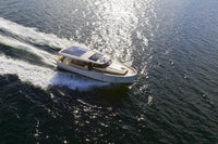 Greenline 40 Electric Yacht with solar panels on the water