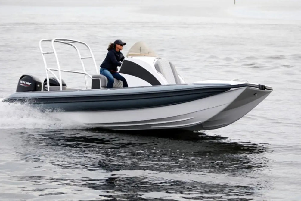 Person driving Hyfoil 22 Electric Boat on a body of water