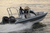 Hyfoil 22 Electric Boat with Mercury outboard motors on a body of water