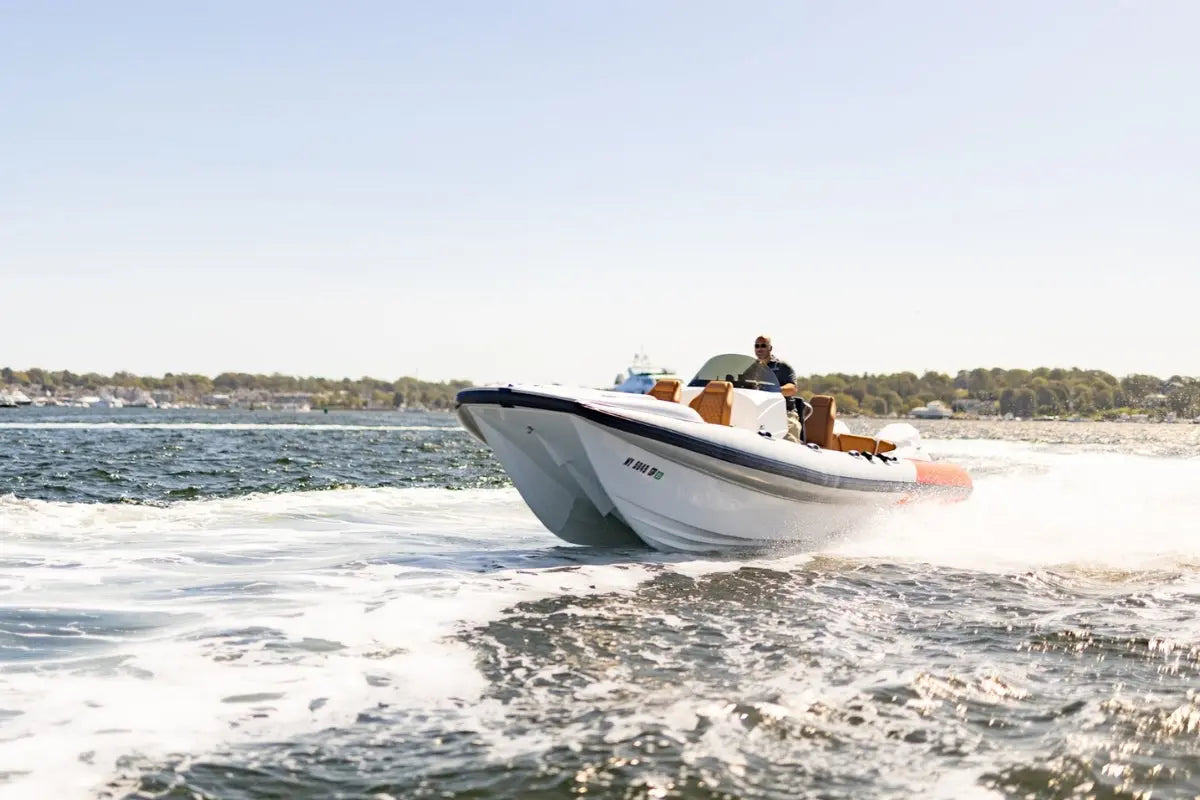 Hyfoil 28 Electric Boat on a body of water with a clear sky