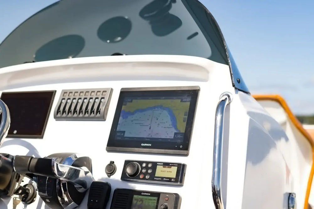 Hyfoil 28 Electric Boat dashboard with navigation equipment against a clear sky