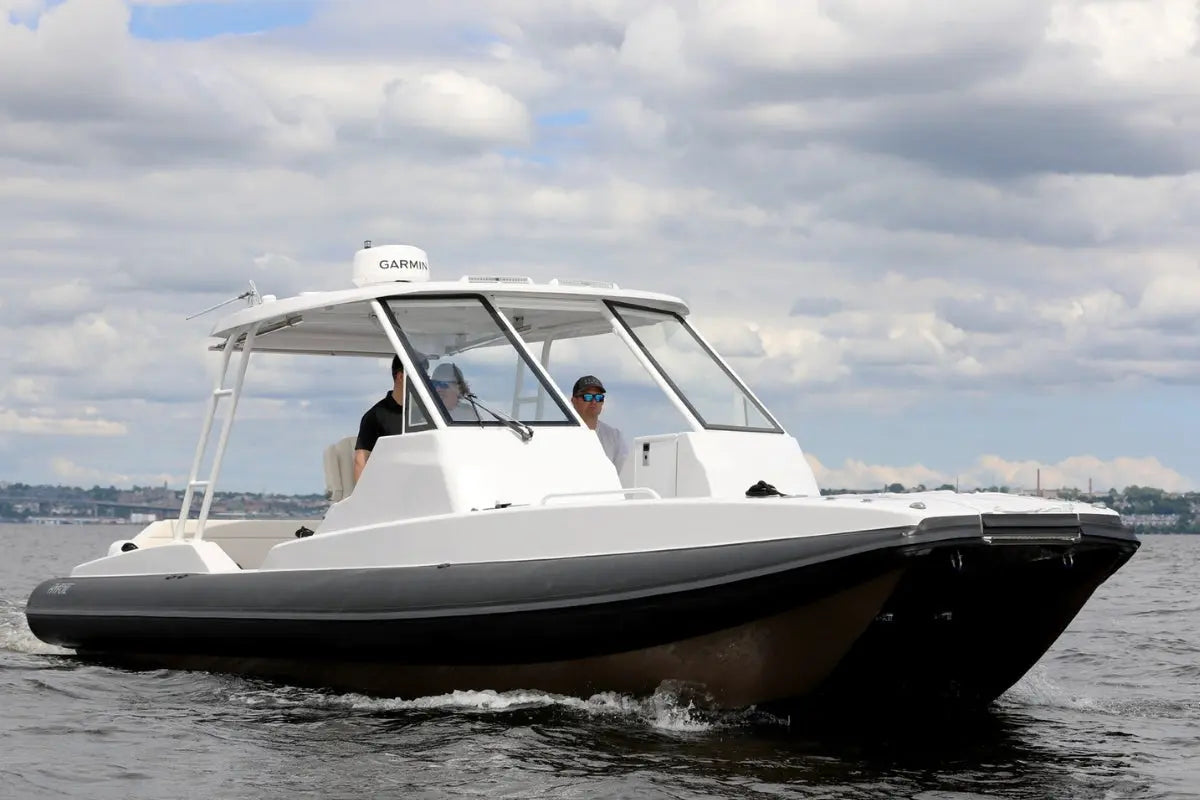 Hyfoil 32 Electric Boat on water with a cloudy sky