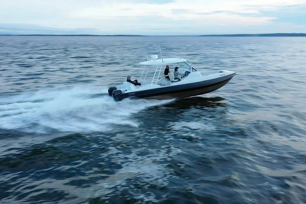 Hyfoil 32 Electric Boat on a body of water with people on board