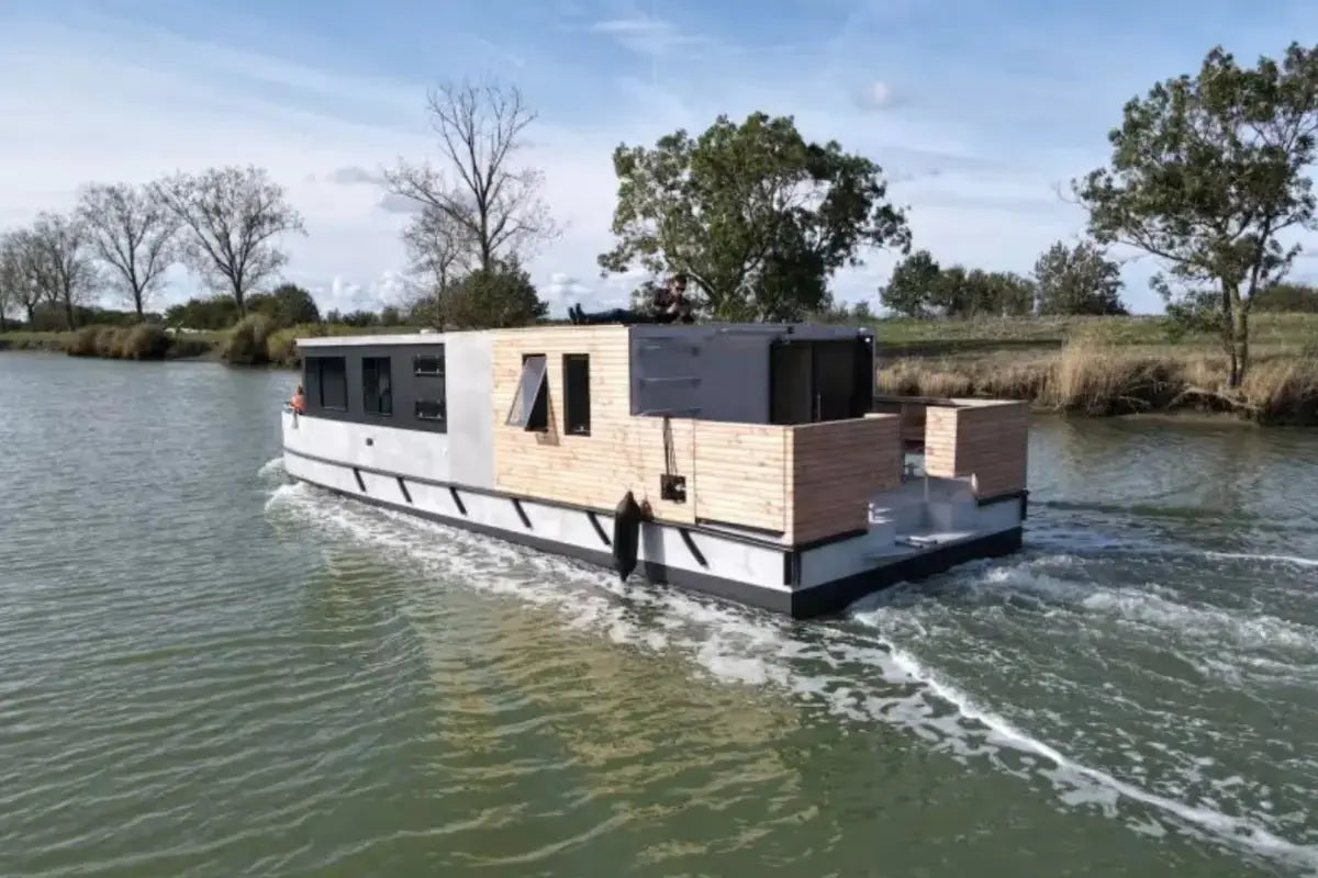 naviwatt_zenriver_electric_house_boat_on_the_water