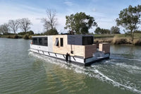naviwatt_zenriver_electric_house_boat_on_the_water
