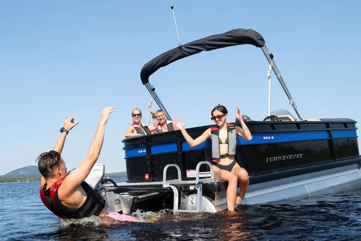 People enjoying a day on Princecraft BrioE 19 Electric Boat on a clear day.