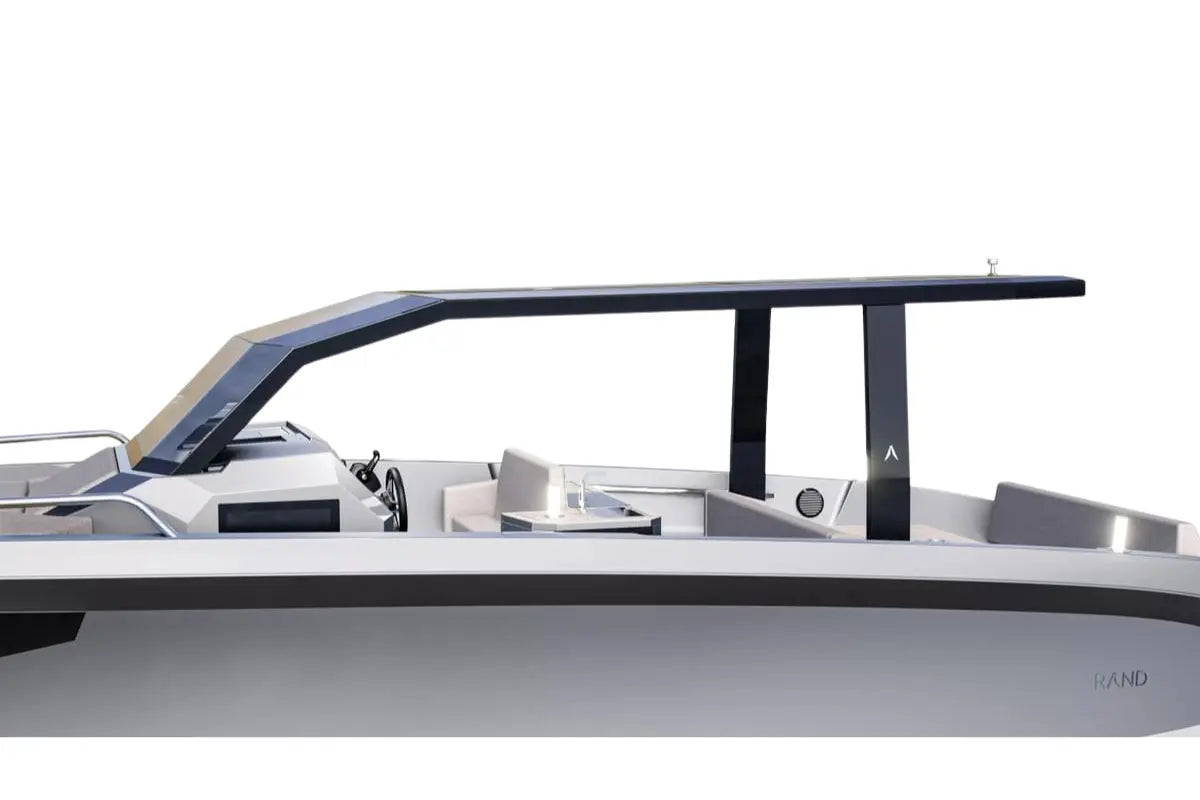 Close-up of Rand Archipelago 32 Electric Boat with a white hull and black railings on a white background