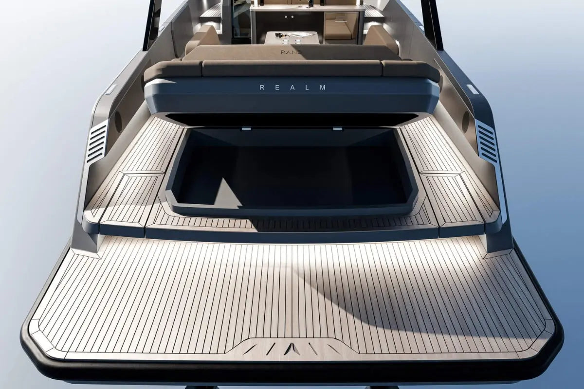 Close-up of Rand Realm 44 Electric Boat interior with 'Realm' branding on a clear sky background