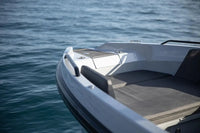 White boat on Rand Roamer 29 Electric Boat of water