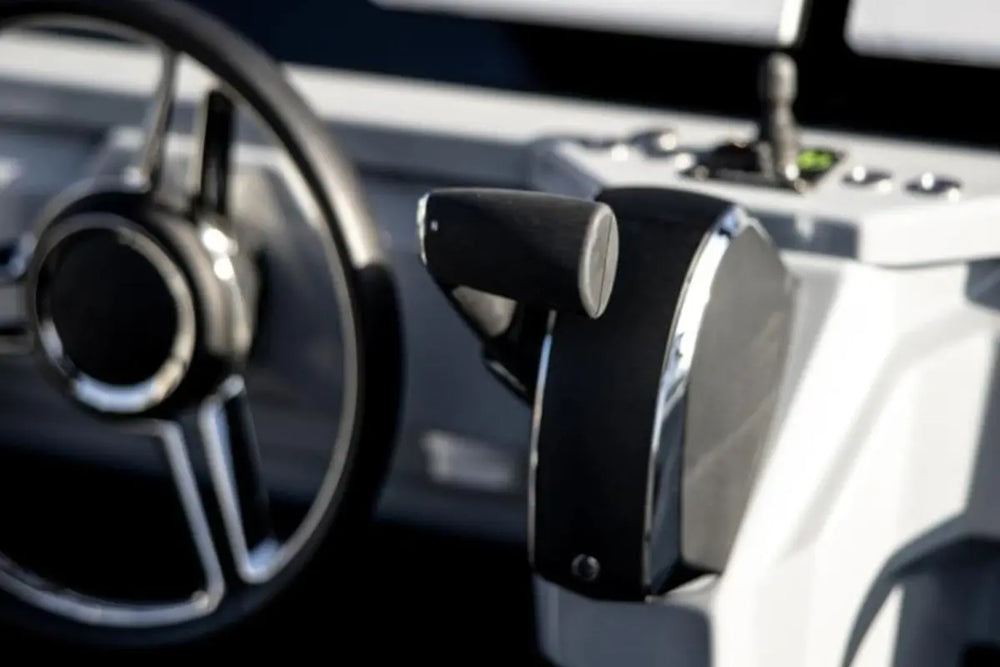 Close-up of Rand Roamer 29 Electric Boat steering wheel and control panel
