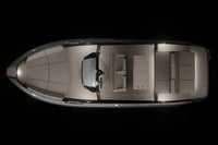 Top-down view of Rand Source 22 Electric Boat interior on a black background