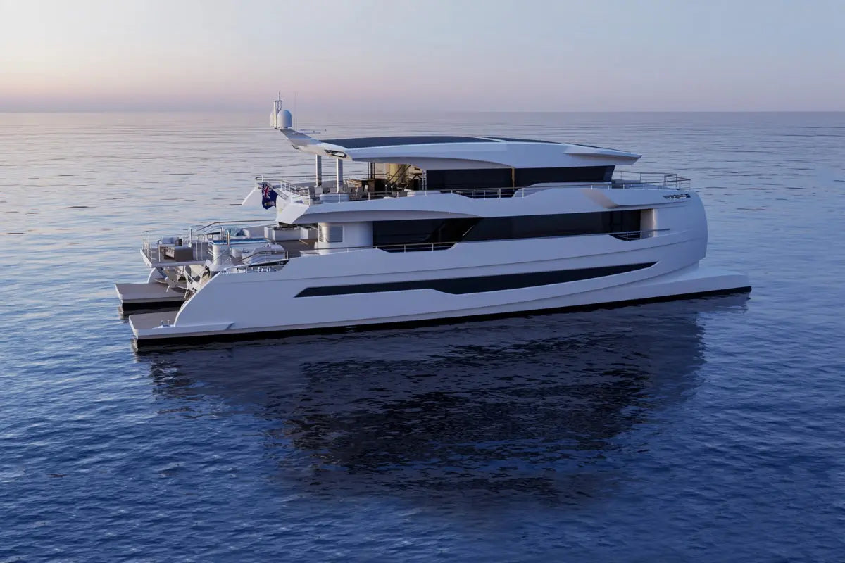 White luxury Silent 120 Explorer Electric Boat on calm water with a clear sky