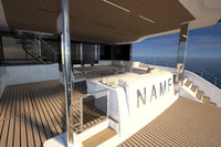 Silent 80 Series Electric Boat deck with seating area and 'NAME' branding, overlooking the ocean.