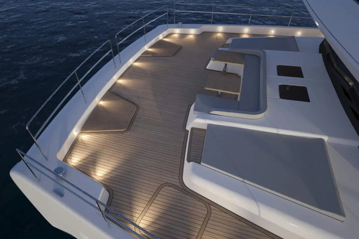 Silent 80 Series Electric Boat deck with seating area and railing on a body of water