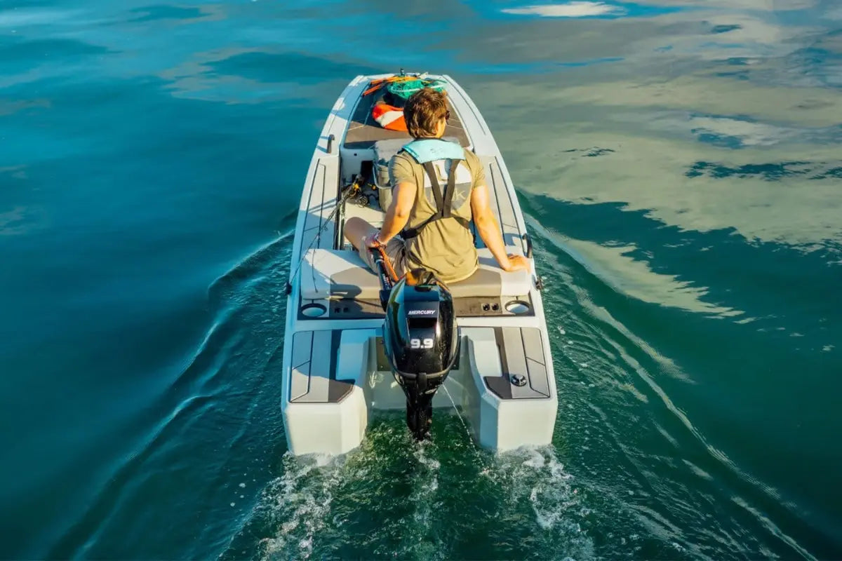 Person on Veer V13 Electric Boat in the middle of a body of water