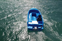 Vision Phantom Electric Boat on a body of water with a person inside