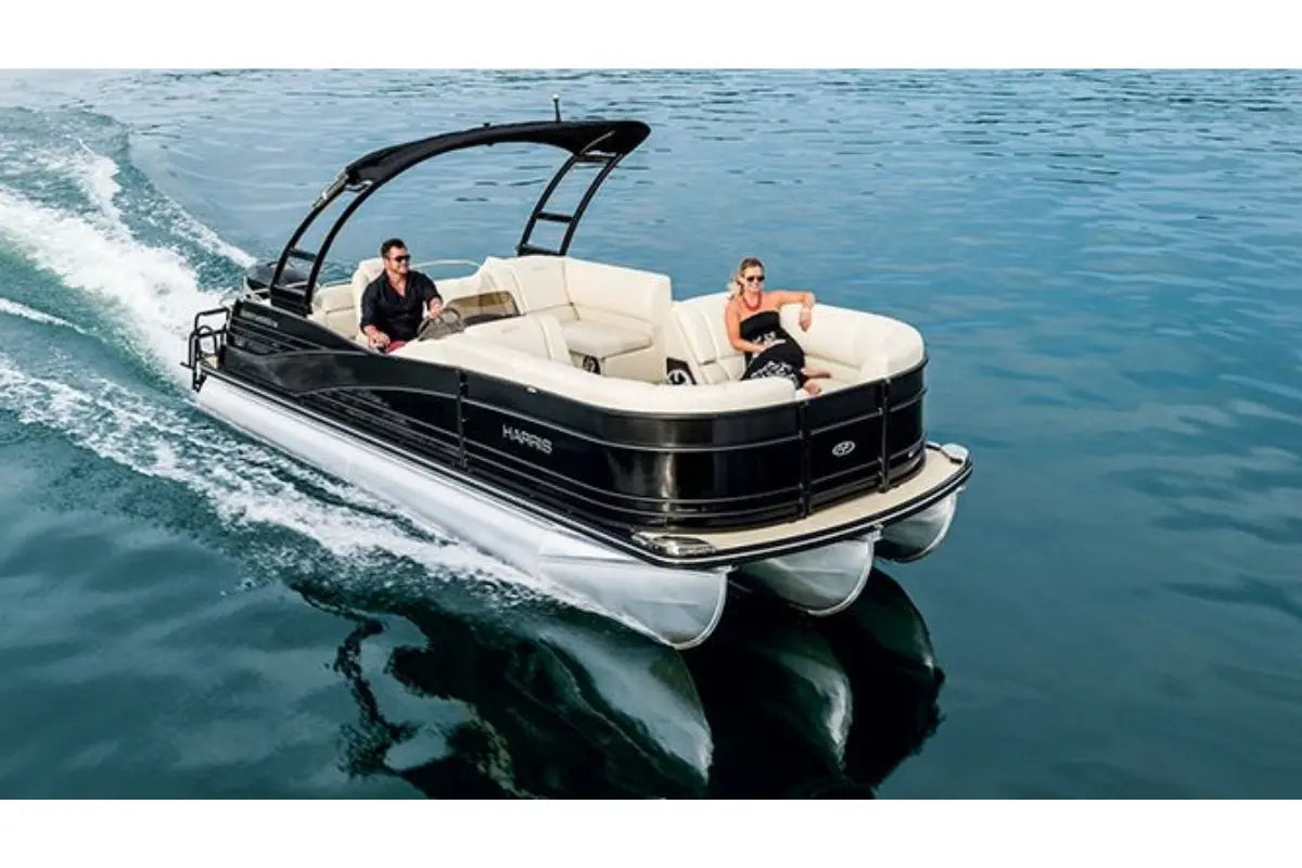 Vision WR Tritoon Electric Boat with people on a body of water
